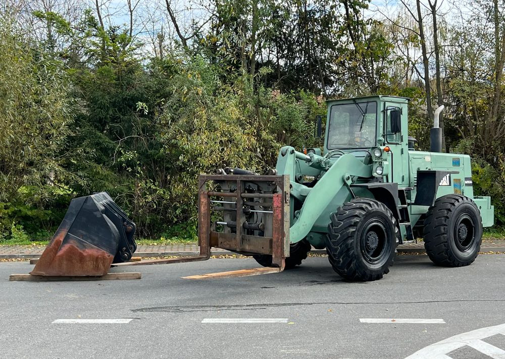 Komatsu Ładowarka KOMATSU 540 EX- Widły Łyżka Bardzo Dobry Stan ( CAT JCB Liebherr ) - Utovarivač na kotačima: slika Komatsu Ładowarka KOMATSU 540 EX- Widły Łyżka Bardzo Dobry Stan ( CAT JCB Liebherr ) - Utovarivač na kotačima Komatsu Ładowarka KOMATSU 540 EX- Widły Łyżka Bardzo Dobry Stan ( CAT JCB Liebherr ) - Utovarivač na kotačima: slika Komatsu Ładowarka KOMATSU 540 EX- Widły Łyżka Bardzo Dobry Stan ( CAT JCB Liebherr ) - Utovarivač na kotačima