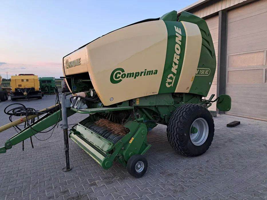 Prasa rolująca Krone Comprima 150XC - Rolo balirka: slika Prasa rolująca Krone Comprima 150XC - Rolo balirka Prasa rolująca Krone Comprima 150XC - Rolo balirka: slika Prasa rolująca Krone Comprima 150XC - Rolo balirka