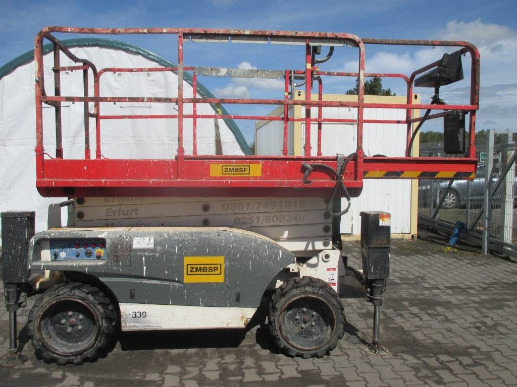 Haulotte Compact 12 DX - Škarasta podizna platforma: slika Haulotte Compact 12 DX - Škarasta podizna platforma Haulotte Compact 12 DX - Škarasta podizna platforma: slika Haulotte Compact 12 DX - Škarasta podizna platforma