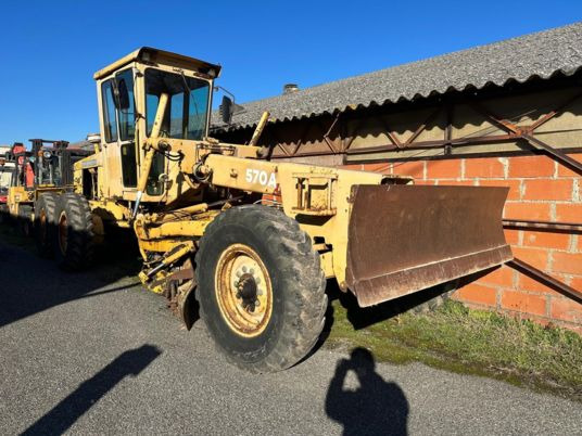 Grejder John Deere 570 A à 12 900 € HT: slika Grejder John Deere 570 A à 12 900 € HT