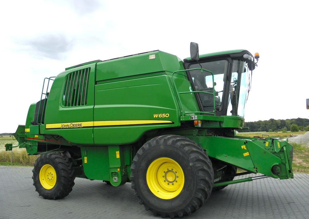 John Deere W650 2008 Rok, heder 6,7m, Nie Malowany, Stan Bardzo Dobry - Kombajn za žetvu: slika John Deere W650 2008 Rok, heder 6,7m, Nie Malowany, Stan Bardzo Dobry - Kombajn za žetvu John Deere W650 2008 Rok, heder 6,7m, Nie Malowany, Stan Bardzo Dobry - Kombajn za žetvu: slika John Deere W650 2008 Rok, heder 6,7m, Nie Malowany, Stan Bardzo Dobry - Kombajn za žetvu