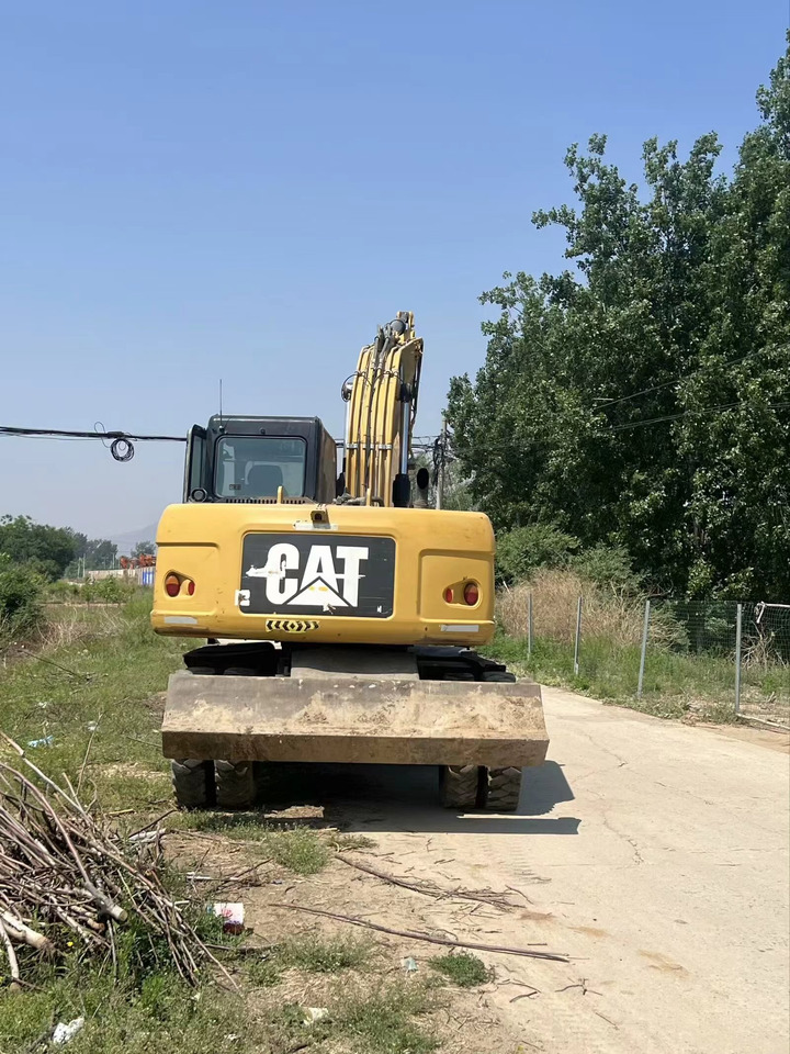 CATERPILLAR M317D2 - Bager na kotačima: slika CATERPILLAR M317D2 - Bager na kotačima CATERPILLAR M317D2 - Bager na kotačima: slika CATERPILLAR M317D2 - Bager na kotačima