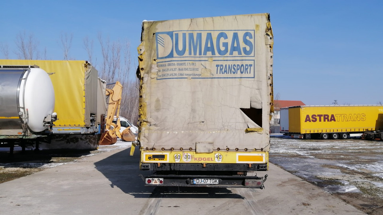 Kögel Tarpaulin with Shutters/Tarpaulin Mega - Poluprikolica s ceradom: slika Kögel Tarpaulin with Shutters/Tarpaulin Mega - Poluprikolica s ceradom Kögel Tarpaulin with Shutters/Tarpaulin Mega - Poluprikolica s ceradom: slika Kögel Tarpaulin with Shutters/Tarpaulin Mega - Poluprikolica s ceradom