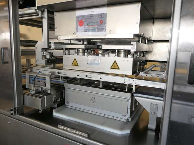 Stroj za pakiranje Tramper filling- and traysealing line GMD99-2: slika Stroj za pakiranje Tramper filling- and traysealing line GMD99-2