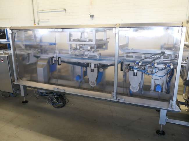 Stroj za pakiranje Tramper filling- and traysealing line GMD99-2: slika Stroj za pakiranje Tramper filling- and traysealing line GMD99-2