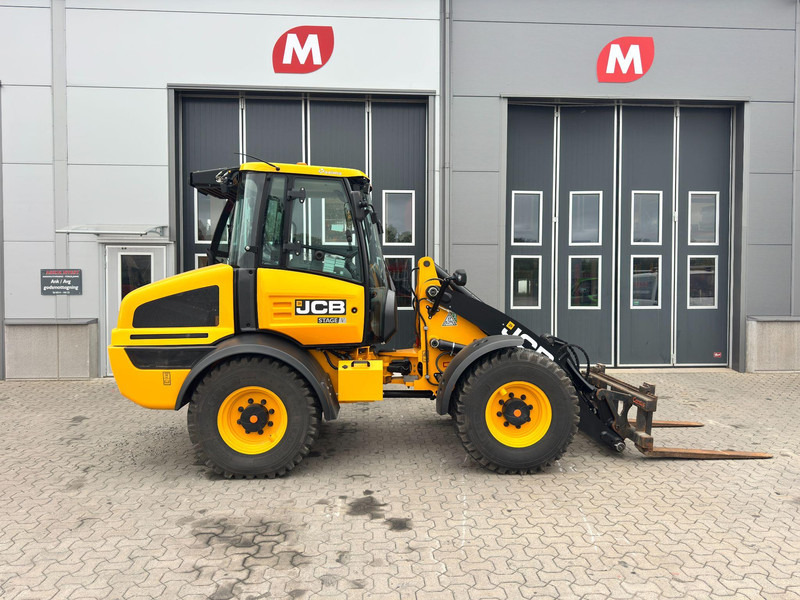JCB 409 JCB 409 Nordic Edition - Utovarivač na kotačima: slika JCB 409 JCB 409 Nordic Edition - Utovarivač na kotačima JCB 409 JCB 409 Nordic Edition - Utovarivač na kotačima: slika JCB 409 JCB 409 Nordic Edition - Utovarivač na kotačima