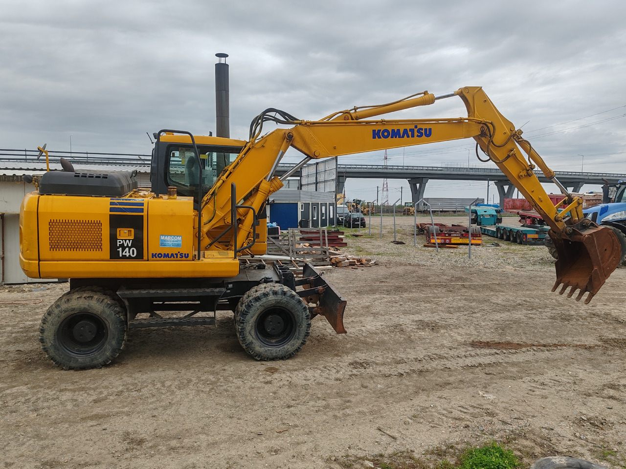 Komatsu PW140-7 - Bager na kotačima: slika Komatsu PW140-7 - Bager na kotačima Komatsu PW140-7 - Bager na kotačima: slika Komatsu PW140-7 - Bager na kotačima