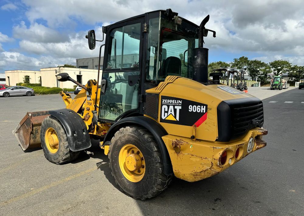 Caterpillar 906H - Utovarivač na kotačima: slika Caterpillar 906H - Utovarivač na kotačima Caterpillar 906H - Utovarivač na kotačima: slika Caterpillar 906H - Utovarivač na kotačima