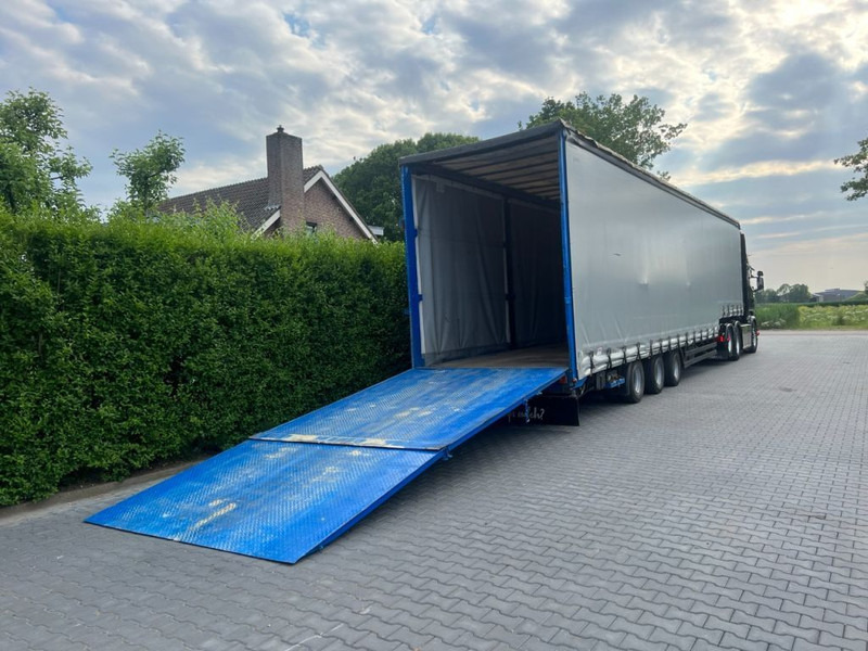 Kögel Semi dieplader met oprijklep - Poluprikolica s niskim utovarivačem: slika Kögel Semi dieplader met oprijklep - Poluprikolica s niskim utovarivačem Kögel Semi dieplader met oprijklep - Poluprikolica s niskim utovarivačem: slika Kögel Semi dieplader met oprijklep - Poluprikolica s niskim utovarivačem
