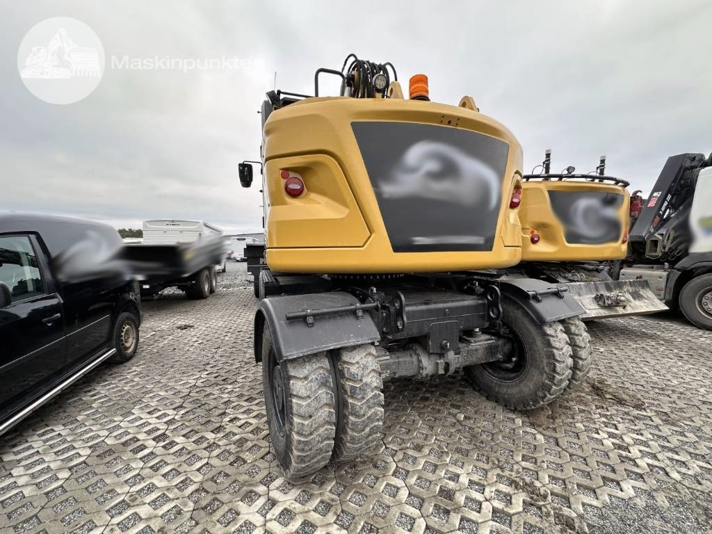 CAT M 315 - Bager na kotačima: slika CAT M 315 - Bager na kotačima CAT M 315 - Bager na kotačima: slika CAT M 315 - Bager na kotačima