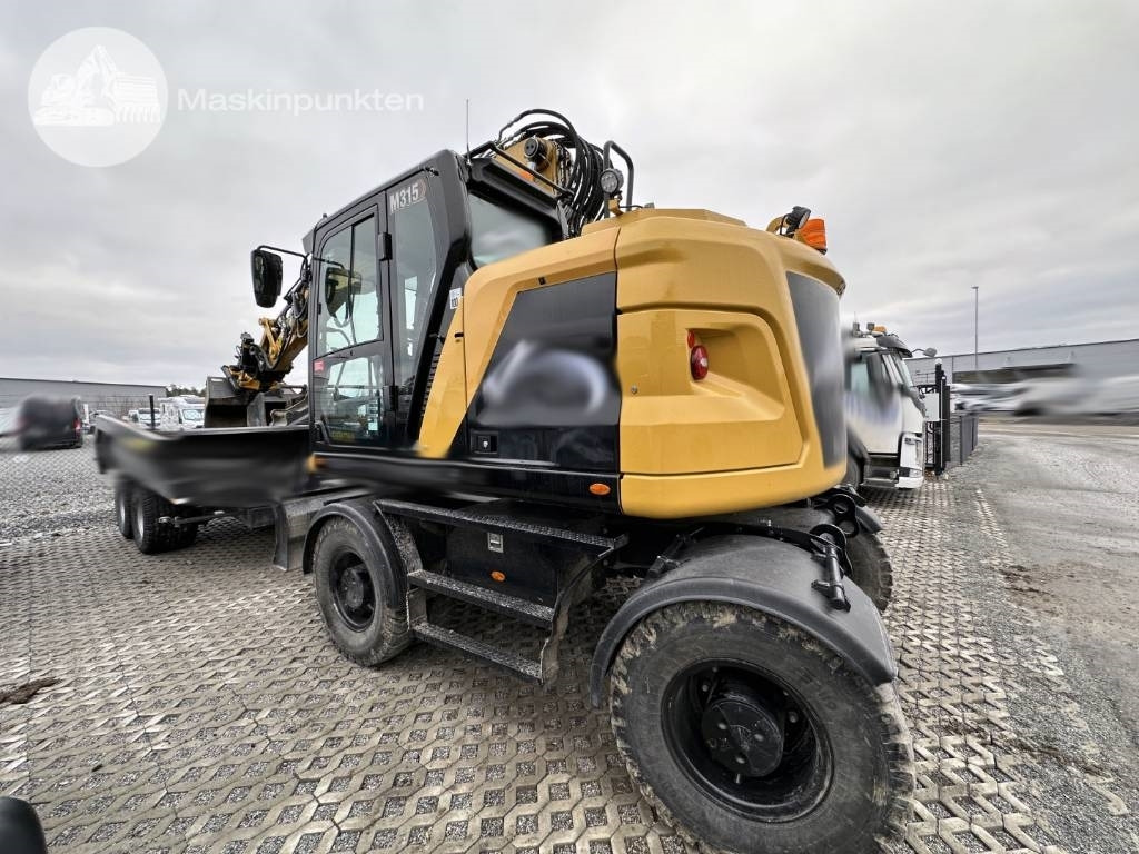 CAT M 315 - Bager na kotačima: slika CAT M 315 - Bager na kotačima CAT M 315 - Bager na kotačima: slika CAT M 315 - Bager na kotačima