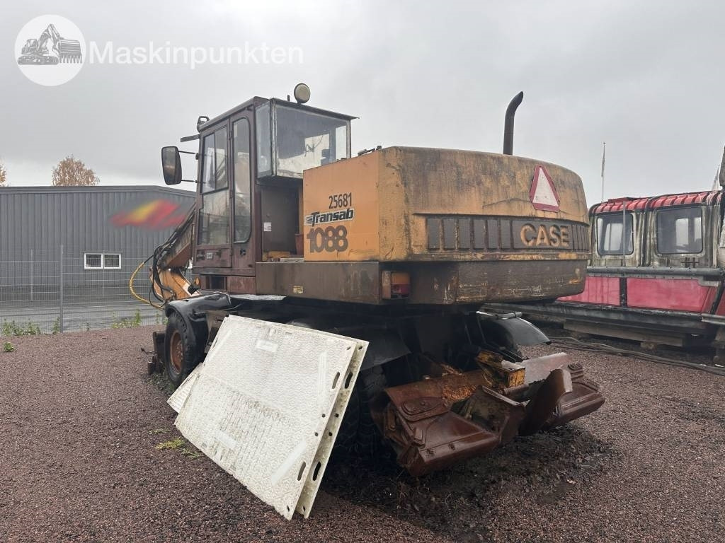 Case Poclain 1088 P - Bager na kotačima: slika Case Poclain 1088 P - Bager na kotačima Case Poclain 1088 P - Bager na kotačima: slika Case Poclain 1088 P - Bager na kotačima