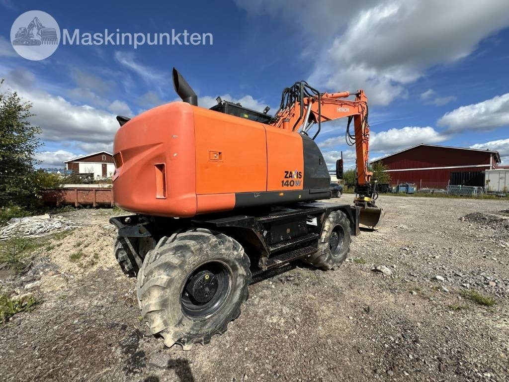 Hitachi ZX 140 W-5B - Bager na kotačima: slika Hitachi ZX 140 W-5B - Bager na kotačima Hitachi ZX 140 W-5B - Bager na kotačima: slika Hitachi ZX 140 W-5B - Bager na kotačima