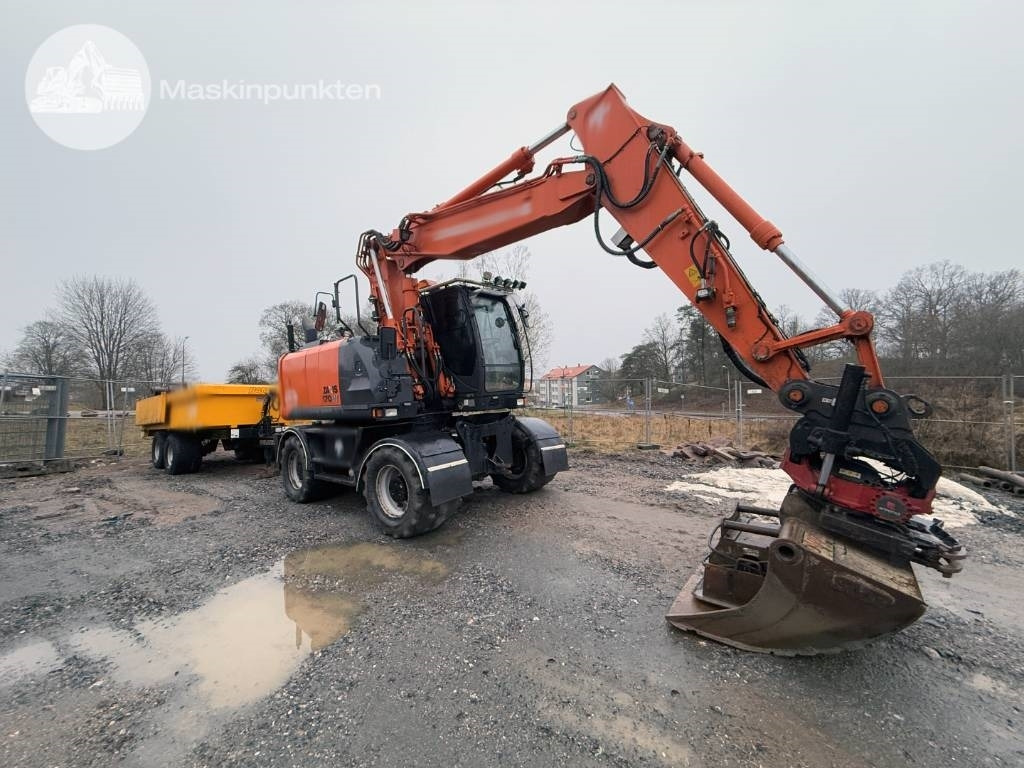 Hitachi ZX 170 W-5 B - Bager na kotačima: slika Hitachi ZX 170 W-5 B - Bager na kotačima Hitachi ZX 170 W-5 B - Bager na kotačima: slika Hitachi ZX 170 W-5 B - Bager na kotačima