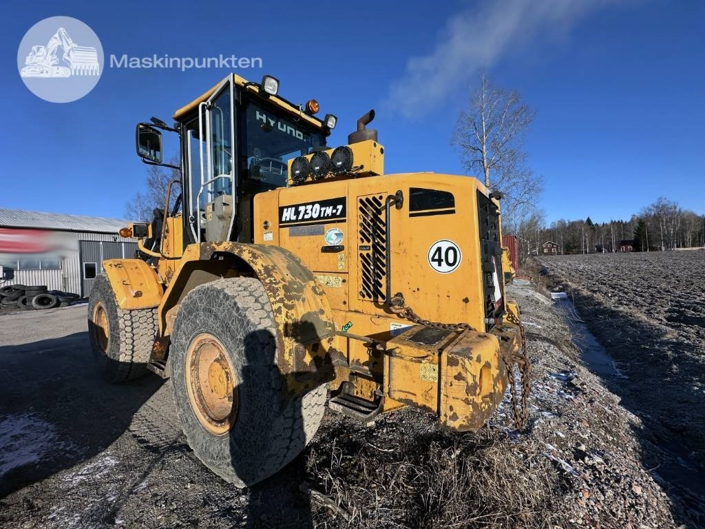 Utovarivač na kotačima Hyundai HL 730 TM-7: slika Utovarivač na kotačima Hyundai HL 730 TM-7 Utovarivač na kotačima Hyundai HL 730 TM-7: slika Utovarivač na kotačima Hyundai HL 730 TM-7