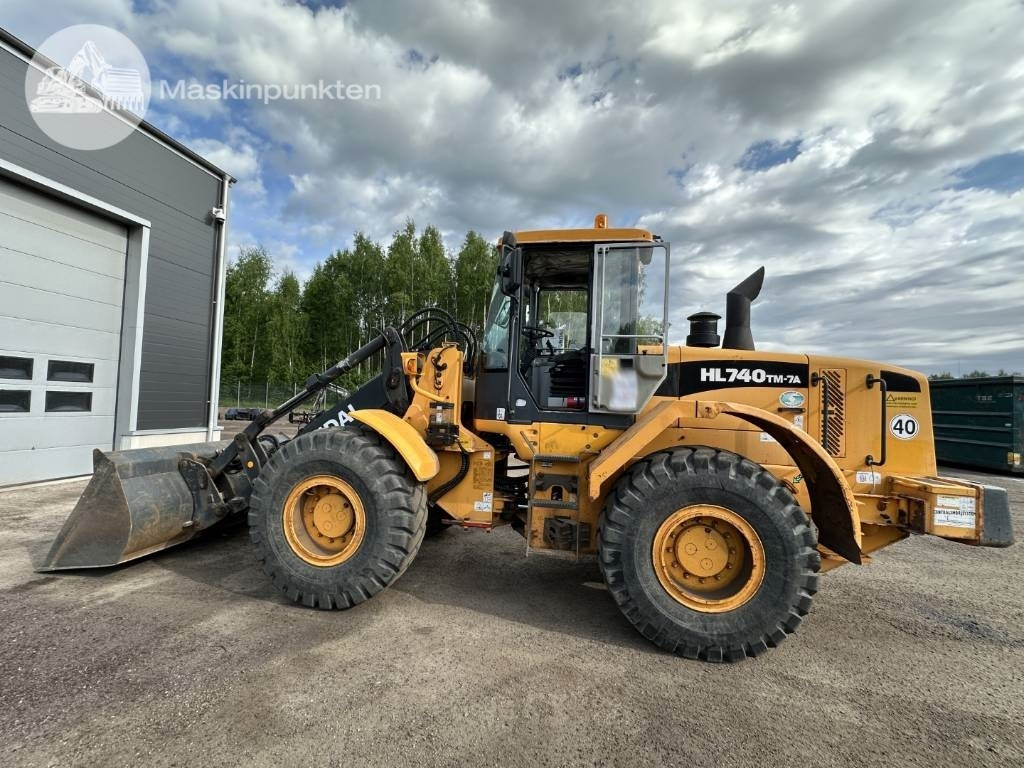 Hyundai HL 740 TM-7 A - Utovarivač na kotačima: slika Hyundai HL 740 TM-7 A - Utovarivač na kotačima Hyundai HL 740 TM-7 A - Utovarivač na kotačima: slika Hyundai HL 740 TM-7 A - Utovarivač na kotačima