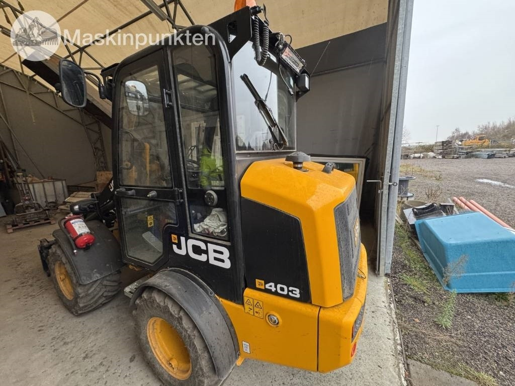 JCB 403 - Utovarivač na kotačima: slika JCB 403 - Utovarivač na kotačima JCB 403 - Utovarivač na kotačima: slika JCB 403 - Utovarivač na kotačima