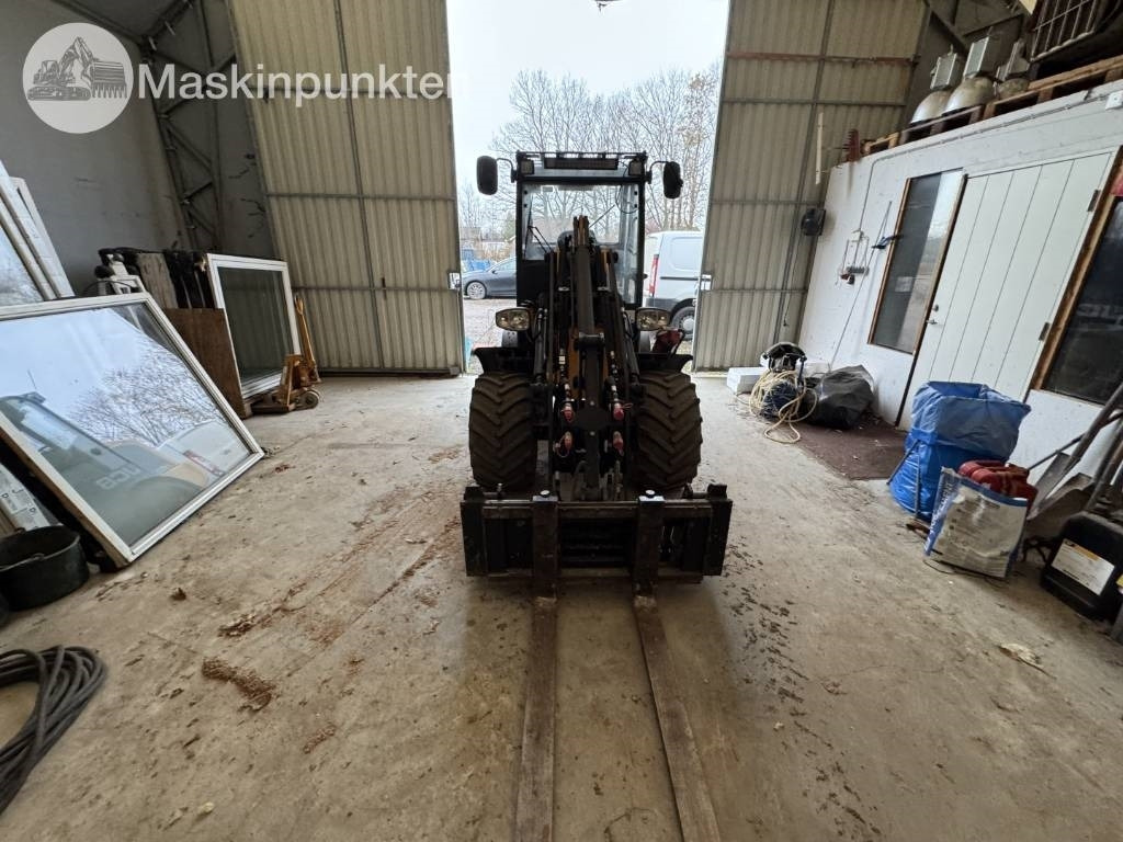 JCB 403 - Utovarivač na kotačima: slika JCB 403 - Utovarivač na kotačima JCB 403 - Utovarivač na kotačima: slika JCB 403 - Utovarivač na kotačima