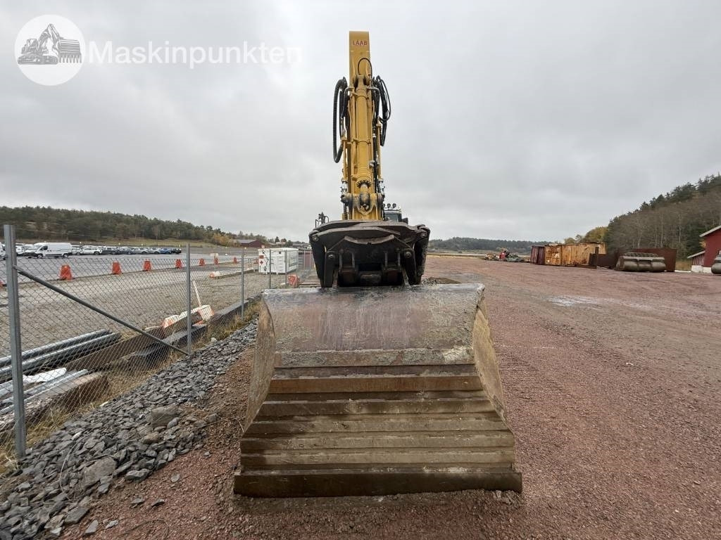 Komatsu PC 210 LC-11EO - Bager gusjeničar: slika Komatsu PC 210 LC-11EO - Bager gusjeničar Komatsu PC 210 LC-11EO - Bager gusjeničar: slika Komatsu PC 210 LC-11EO - Bager gusjeničar