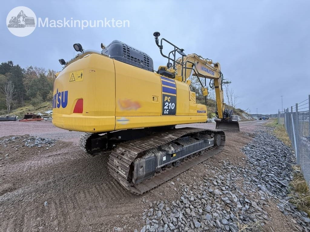 Komatsu PC 210 LC-11EO - Bager gusjeničar: slika Komatsu PC 210 LC-11EO - Bager gusjeničar Komatsu PC 210 LC-11EO - Bager gusjeničar: slika Komatsu PC 210 LC-11EO - Bager gusjeničar