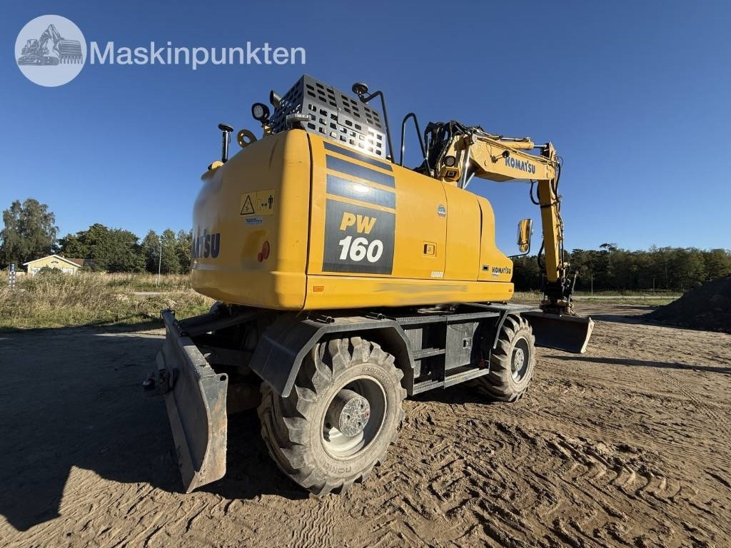 Komatsu PW 160 - Bager na kotačima: slika Komatsu PW 160 - Bager na kotačima Komatsu PW 160 - Bager na kotačima: slika Komatsu PW 160 - Bager na kotačima