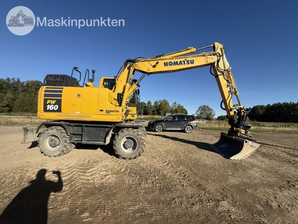 Komatsu PW 160 - Bager na kotačima: slika Komatsu PW 160 - Bager na kotačima Komatsu PW 160 - Bager na kotačima: slika Komatsu PW 160 - Bager na kotačima