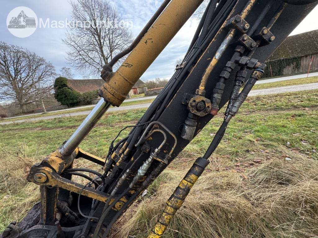 Bager na kotačima Liebherr A 310 B: slika Bager na kotačima Liebherr A 310 B Bager na kotačima Liebherr A 310 B: slika Bager na kotačima Liebherr A 310 B