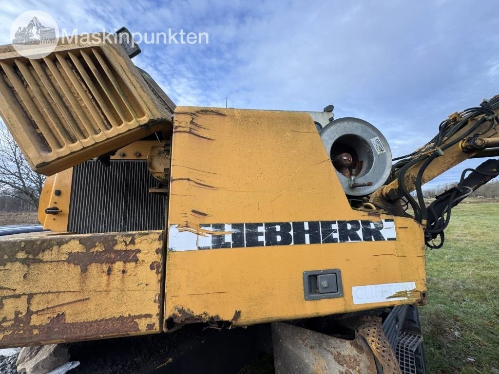 Bager na kotačima Liebherr A 310 B: slika Bager na kotačima Liebherr A 310 B Bager na kotačima Liebherr A 310 B: slika Bager na kotačima Liebherr A 310 B