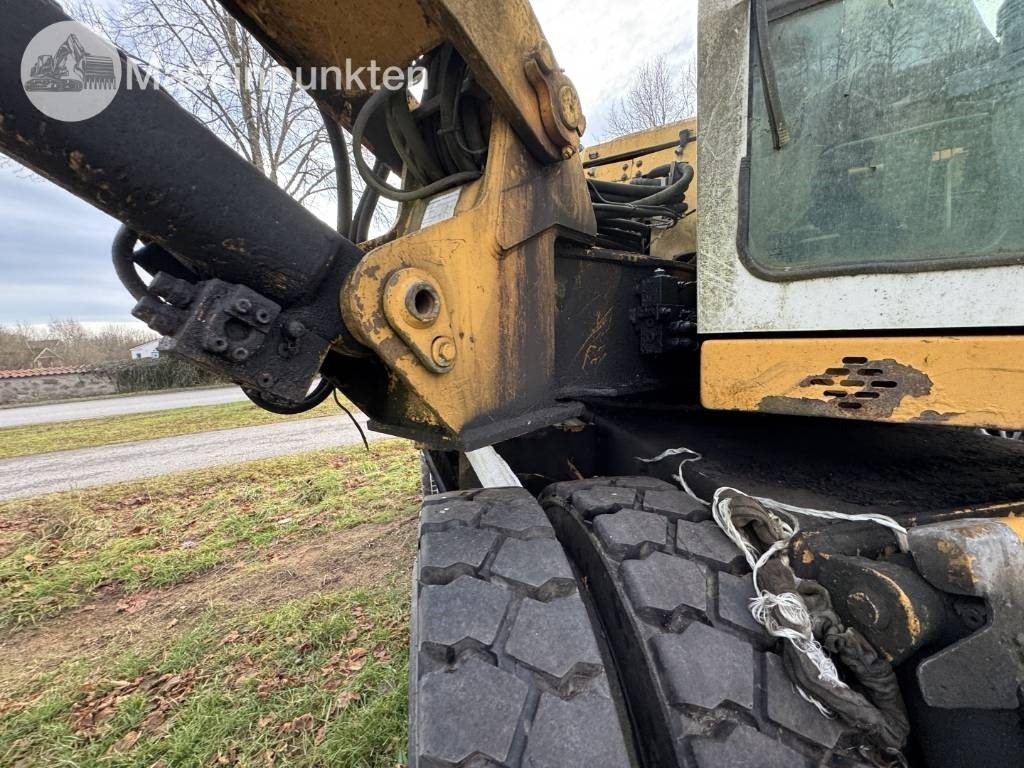 Bager na kotačima Liebherr A 310 B: slika Bager na kotačima Liebherr A 310 B Bager na kotačima Liebherr A 310 B: slika Bager na kotačima Liebherr A 310 B