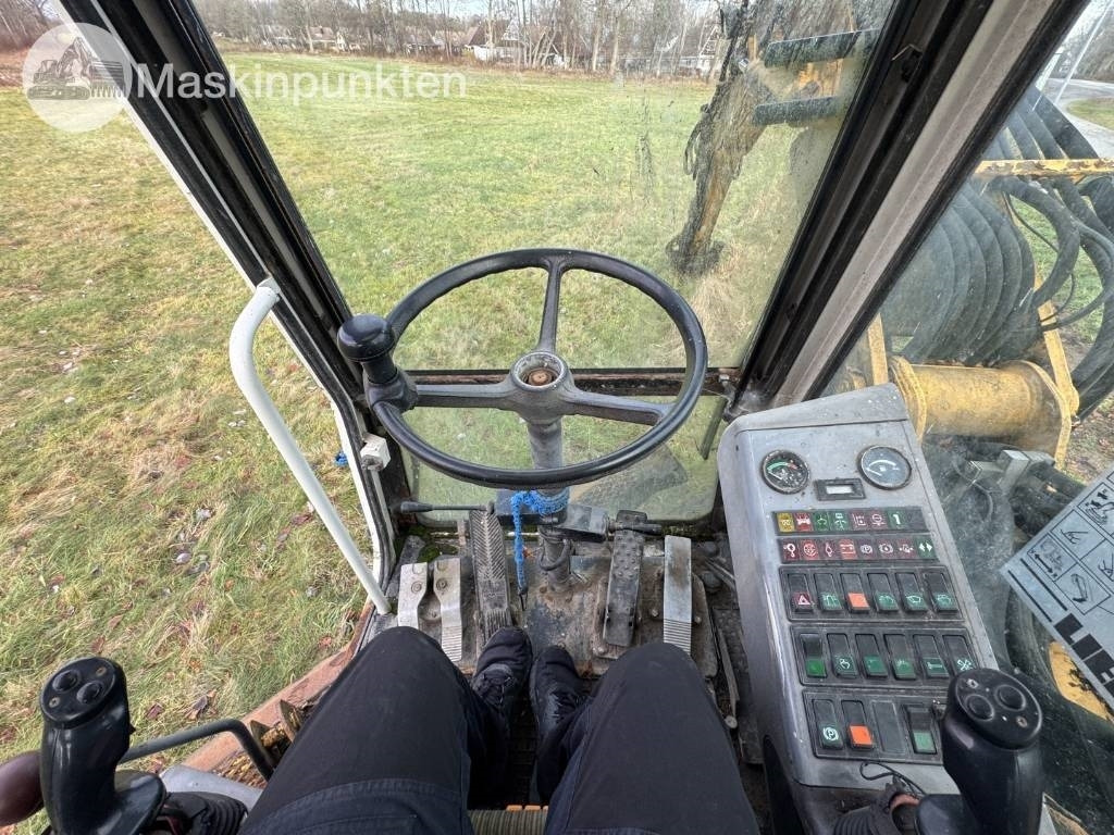 Bager na kotačima Liebherr A 310 B: slika Bager na kotačima Liebherr A 310 B Bager na kotačima Liebherr A 310 B: slika Bager na kotačima Liebherr A 310 B