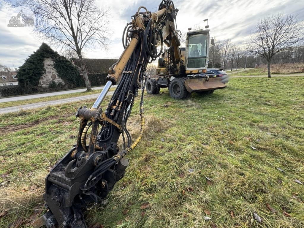 Liebherr A 310 B - Bager na kotačima: slika Liebherr A 310 B - Bager na kotačima Liebherr A 310 B - Bager na kotačima: slika Liebherr A 310 B - Bager na kotačima