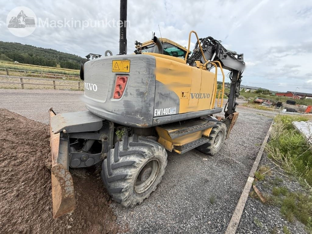Volvo EW 140 C - Bager na kotačima: slika Volvo EW 140 C - Bager na kotačima Volvo EW 140 C - Bager na kotačima: slika Volvo EW 140 C - Bager na kotačima