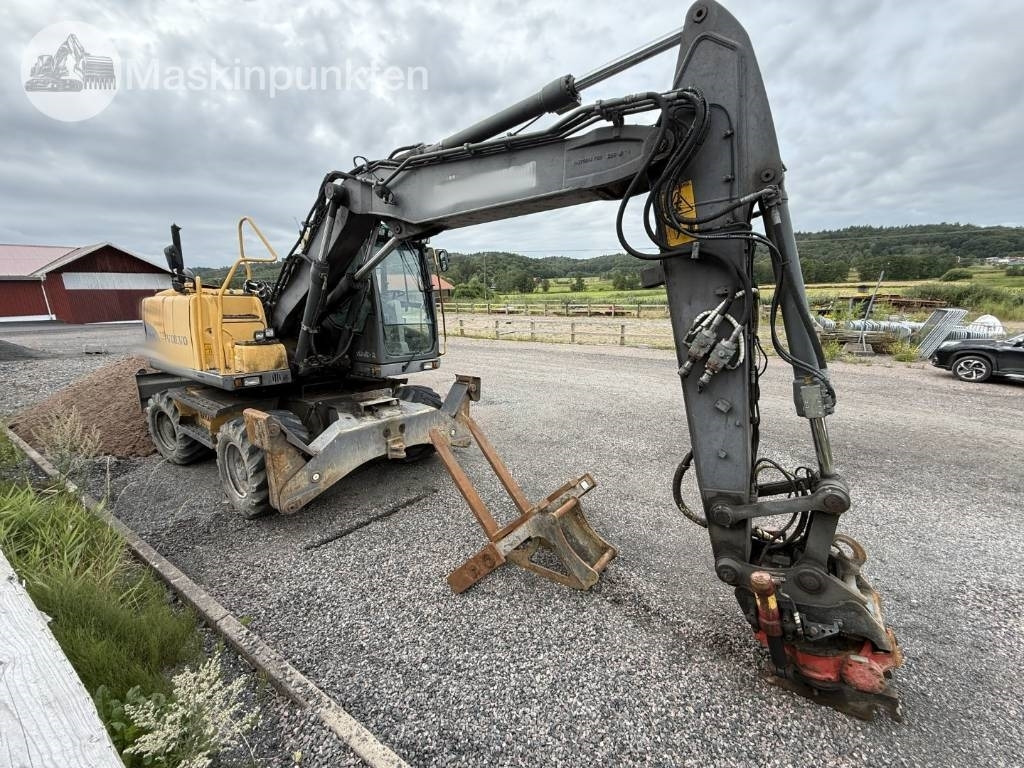 Volvo EW 140 C - Bager na kotačima: slika Volvo EW 140 C - Bager na kotačima Volvo EW 140 C - Bager na kotačima: slika Volvo EW 140 C - Bager na kotačima