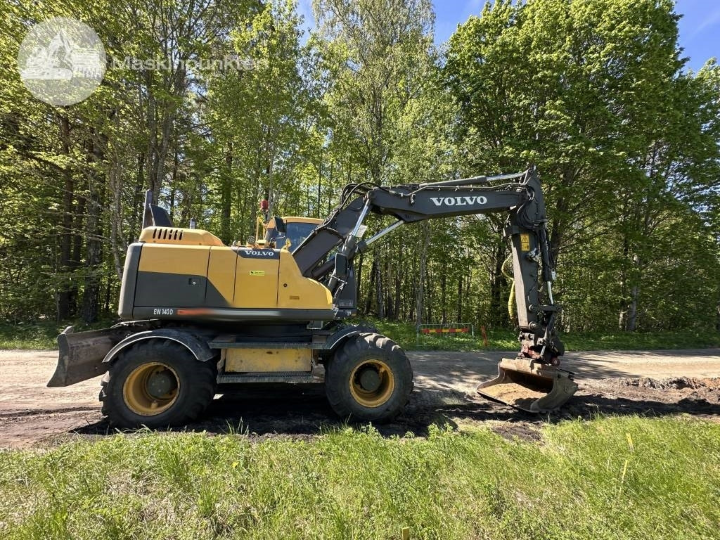 Volvo EW 140 D - Bager na kotačima: slika Volvo EW 140 D - Bager na kotačima Volvo EW 140 D - Bager na kotačima: slika Volvo EW 140 D - Bager na kotačima