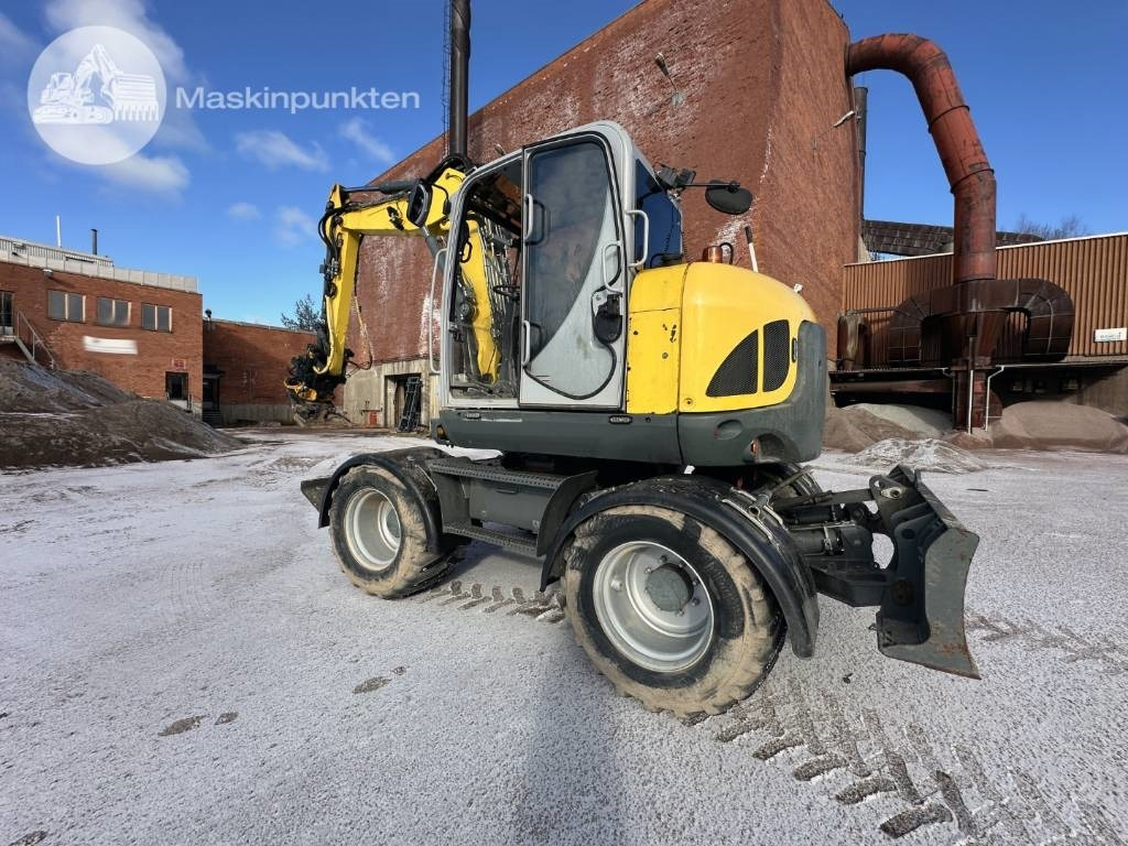 Wacker Neuson EW 100 - Bager na kotačima: slika Wacker Neuson EW 100 - Bager na kotačima Wacker Neuson EW 100 - Bager na kotačima: slika Wacker Neuson EW 100 - Bager na kotačima