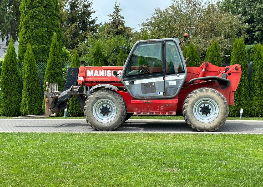 Manitou MT 1233S 12 M - Teleskopski rukovatelj: slika Manitou MT 1233S 12 M - Teleskopski rukovatelj Manitou MT 1233S 12 M - Teleskopski rukovatelj: slika Manitou MT 1233S 12 M - Teleskopski rukovatelj