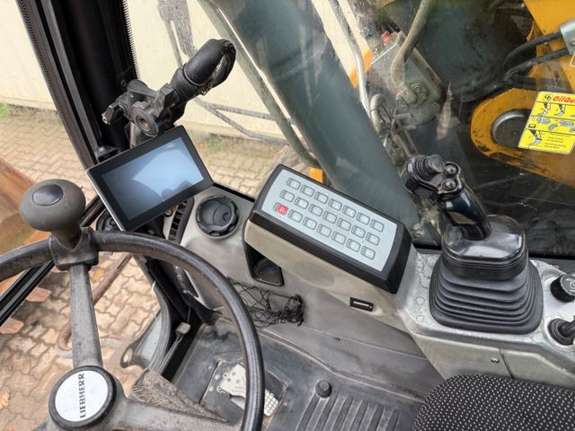 Bager na kotačima Liebherr A914 Compact / 2017 BJ / 9.979 H / OilQuick: slika Bager na kotačima Liebherr A914 Compact / 2017 BJ / 9.979 H / OilQuick