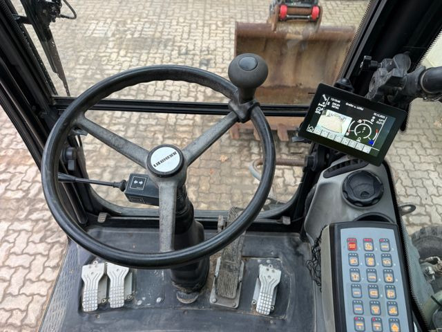 Bager na kotačima Liebherr A914 Compact / 2017 BJ / 9.979 H / OilQuick: slika Bager na kotačima Liebherr A914 Compact / 2017 BJ / 9.979 H / OilQuick