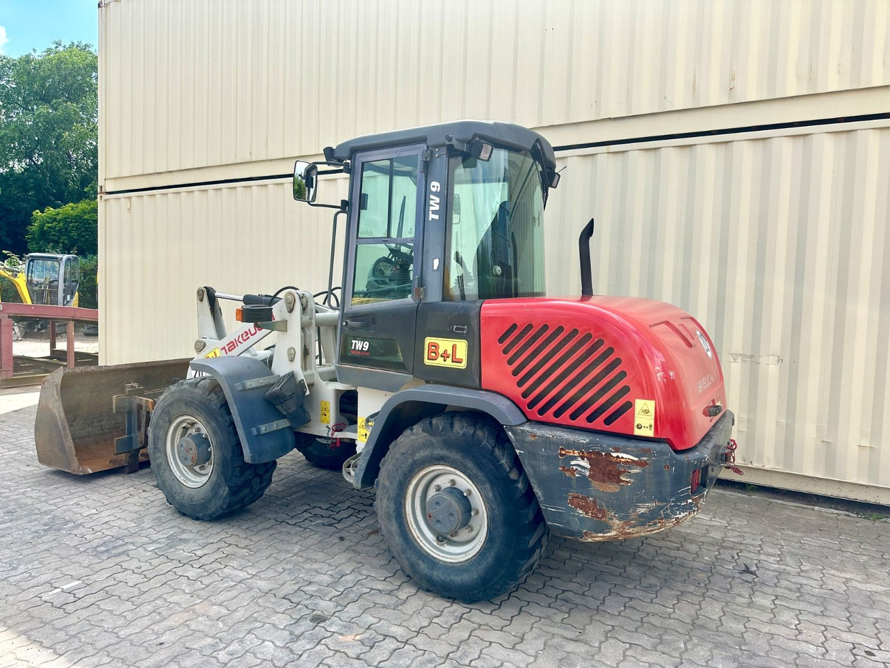 Takeuchi TW9 /4.800 KG /Deutsche Maschine /Gabel+Schaufel - Utovarivač na kotačima: slika  Takeuchi TW9 /4.800 KG /Deutsche Maschine /Gabel+Schaufel - Utovarivač na kotačima Takeuchi TW9 /4.800 KG /Deutsche Maschine /Gabel+Schaufel - Utovarivač na kotačima: slika  Takeuchi TW9 /4.800 KG /Deutsche Maschine /Gabel+Schaufel - Utovarivač na kotačima