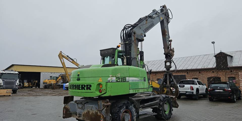 Koparka kołowa Liebherr A 316 Litronic chwytak podpory pług - Bager na kotačima: slika Koparka kołowa Liebherr A 316 Litronic chwytak podpory pług - Bager na kotačima Koparka kołowa Liebherr A 316 Litronic chwytak podpory pług - Bager na kotačima: slika Koparka kołowa Liebherr A 316 Litronic chwytak podpory pług - Bager na kotačima