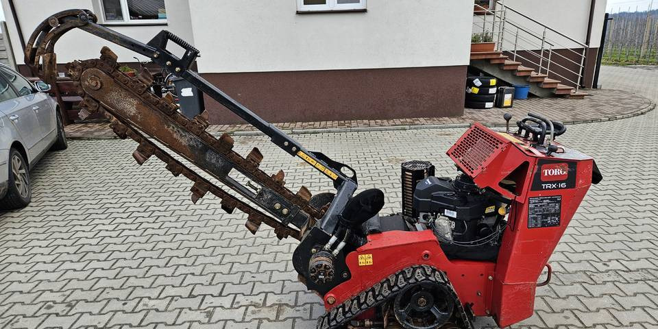 Koparka łańcuchowa Toro TRX 16 - Trenčer: slika Koparka łańcuchowa Toro TRX 16 - Trenčer Koparka łańcuchowa Toro TRX 16 - Trenčer: slika Koparka łańcuchowa Toro TRX 16 - Trenčer