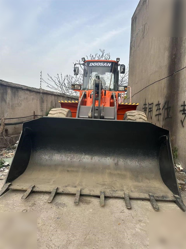 DOOSAN DL503 - Utovarivač na kotačima: slika DOOSAN DL503 - Utovarivač na kotačima DOOSAN DL503 - Utovarivač na kotačima: slika DOOSAN DL503 - Utovarivač na kotačima