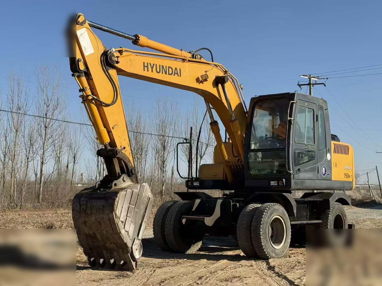 HYUNDAI ROBEX 150W-7A - Bager na kotačima: slika HYUNDAI ROBEX 150W-7A - Bager na kotačima HYUNDAI ROBEX 150W-7A - Bager na kotačima: slika HYUNDAI ROBEX 150W-7A - Bager na kotačima
