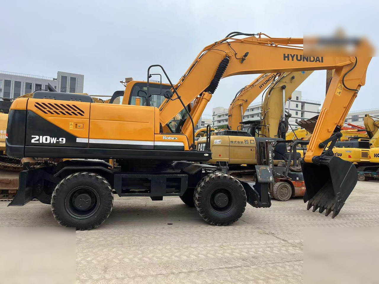 HYUNDAI ROBEX 210W-9 - Bager na kotačima: slika HYUNDAI ROBEX 210W-9 - Bager na kotačima HYUNDAI ROBEX 210W-9 - Bager na kotačima: slika HYUNDAI ROBEX 210W-9 - Bager na kotačima