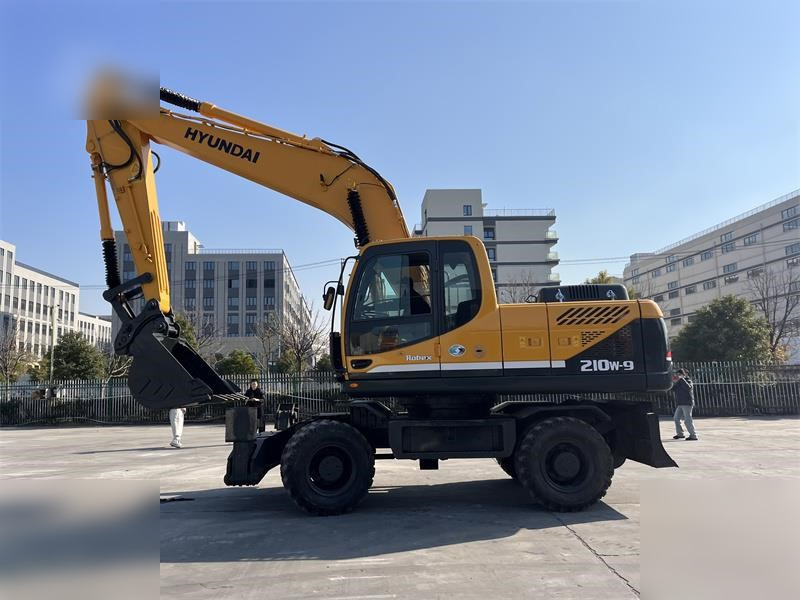 HYUNDAI ROBEX 210W-9 - Bager na kotačima: slika HYUNDAI ROBEX 210W-9 - Bager na kotačima HYUNDAI ROBEX 210W-9 - Bager na kotačima: slika HYUNDAI ROBEX 210W-9 - Bager na kotačima