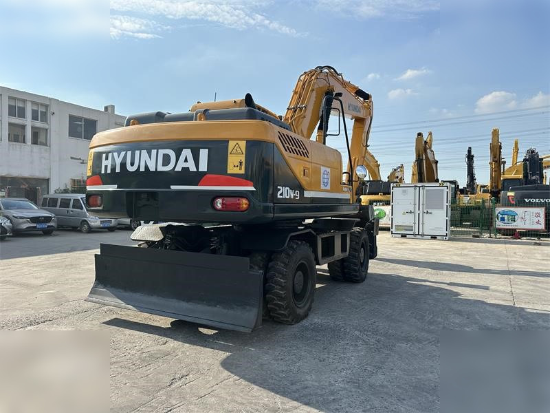HYUNDAI ROBEX 210W-9 - Bager na kotačima: slika HYUNDAI ROBEX 210W-9 - Bager na kotačima HYUNDAI ROBEX 210W-9 - Bager na kotačima: slika HYUNDAI ROBEX 210W-9 - Bager na kotačima
