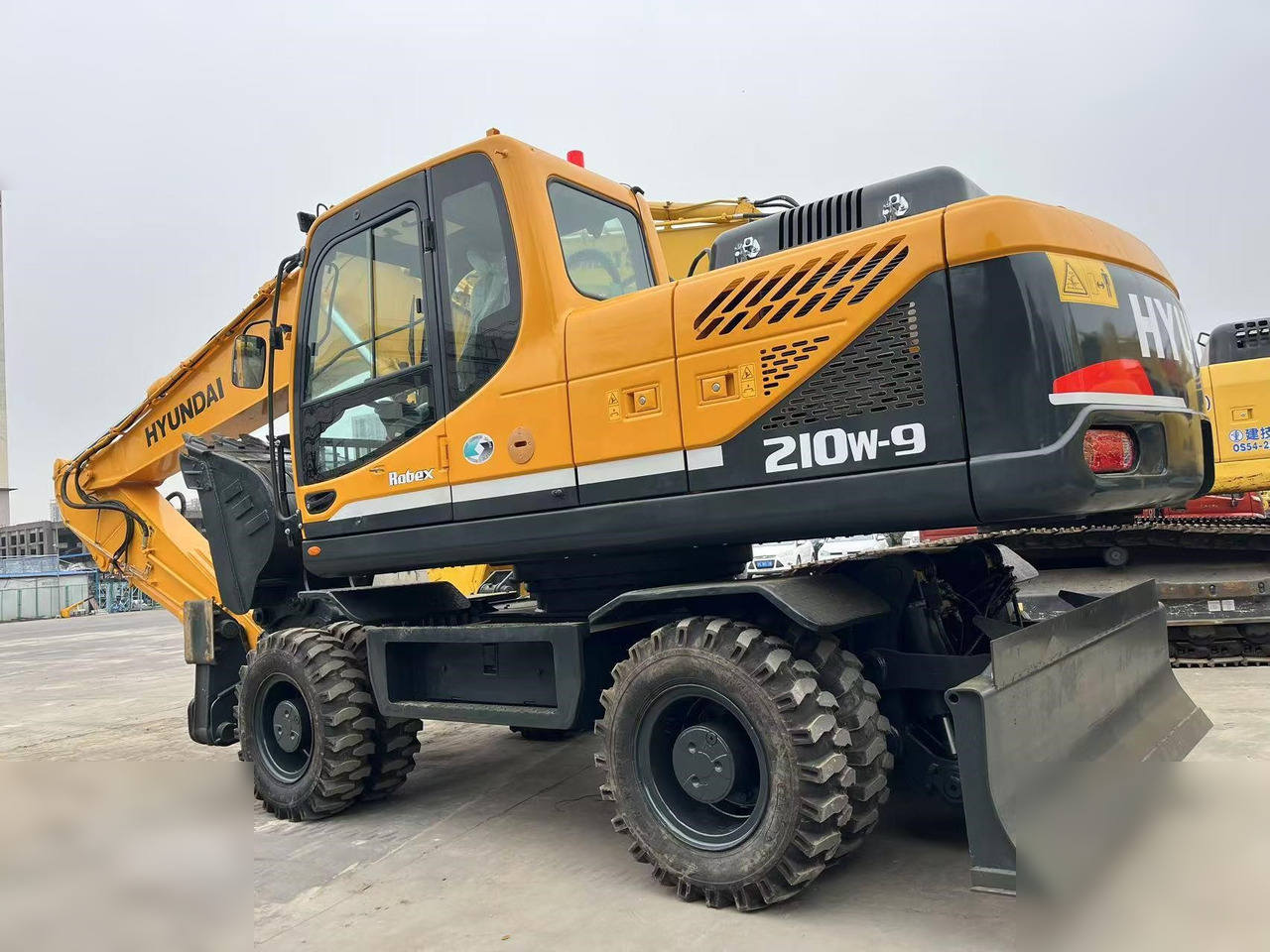 HYUNDAI ROBEX 210W-9S - Bager na kotačima: slika HYUNDAI ROBEX 210W-9S - Bager na kotačima HYUNDAI ROBEX 210W-9S - Bager na kotačima: slika HYUNDAI ROBEX 210W-9S - Bager na kotačima