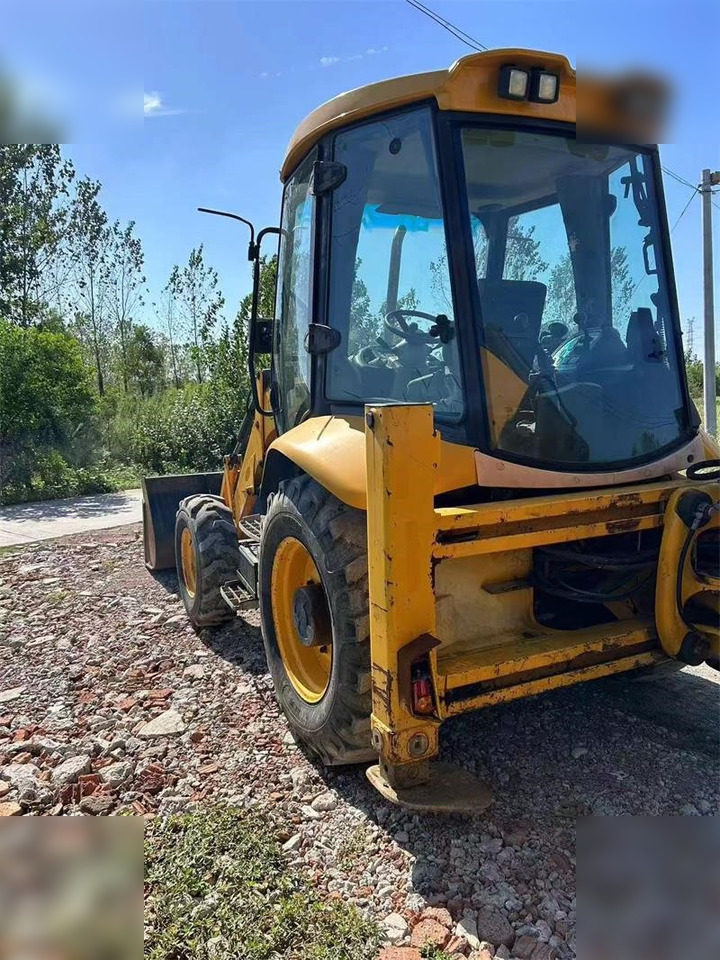 JCB 3CX - Rovokopač-utovarivač: slika JCB 3CX - Rovokopač-utovarivač JCB 3CX - Rovokopač-utovarivač: slika JCB 3CX - Rovokopač-utovarivač