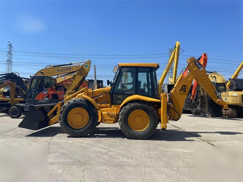 JCB 4CX - Rovokopač-utovarivač: slika JCB 4CX - Rovokopač-utovarivač JCB 4CX - Rovokopač-utovarivač: slika JCB 4CX - Rovokopač-utovarivač
