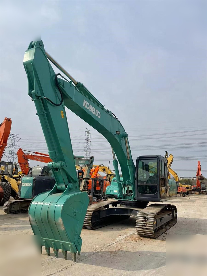 KOBELCO SK210-8 - Bager gusjeničar: slika KOBELCO SK210-8 - Bager gusjeničar KOBELCO SK210-8 - Bager gusjeničar: slika KOBELCO SK210-8 - Bager gusjeničar